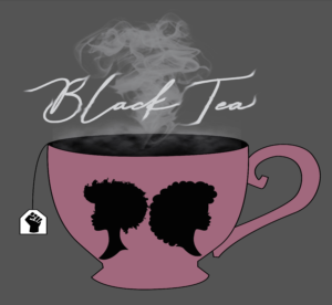 A pink, steamy teacup on a grey background. On the cup there are two profile silhouettes of black women's heads back to bag. The tea tag has a black power fist. 